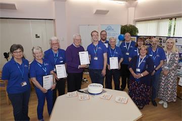 Volunteers celebrate 60 years of Radio Horton. Some received long service awards